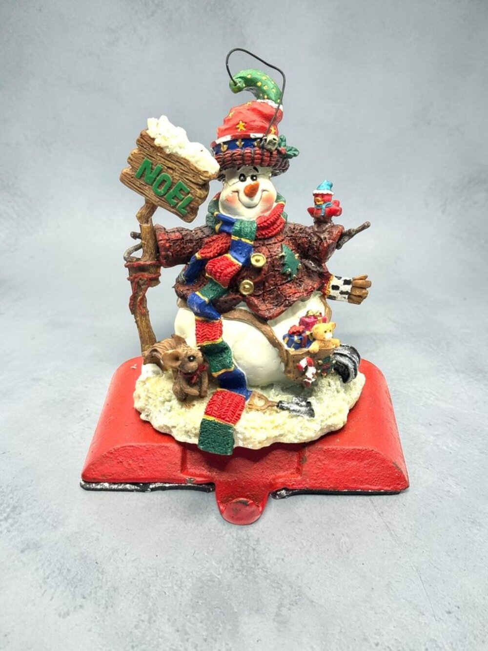 Snowman Stocking Holder With Noel Sign & Red Base